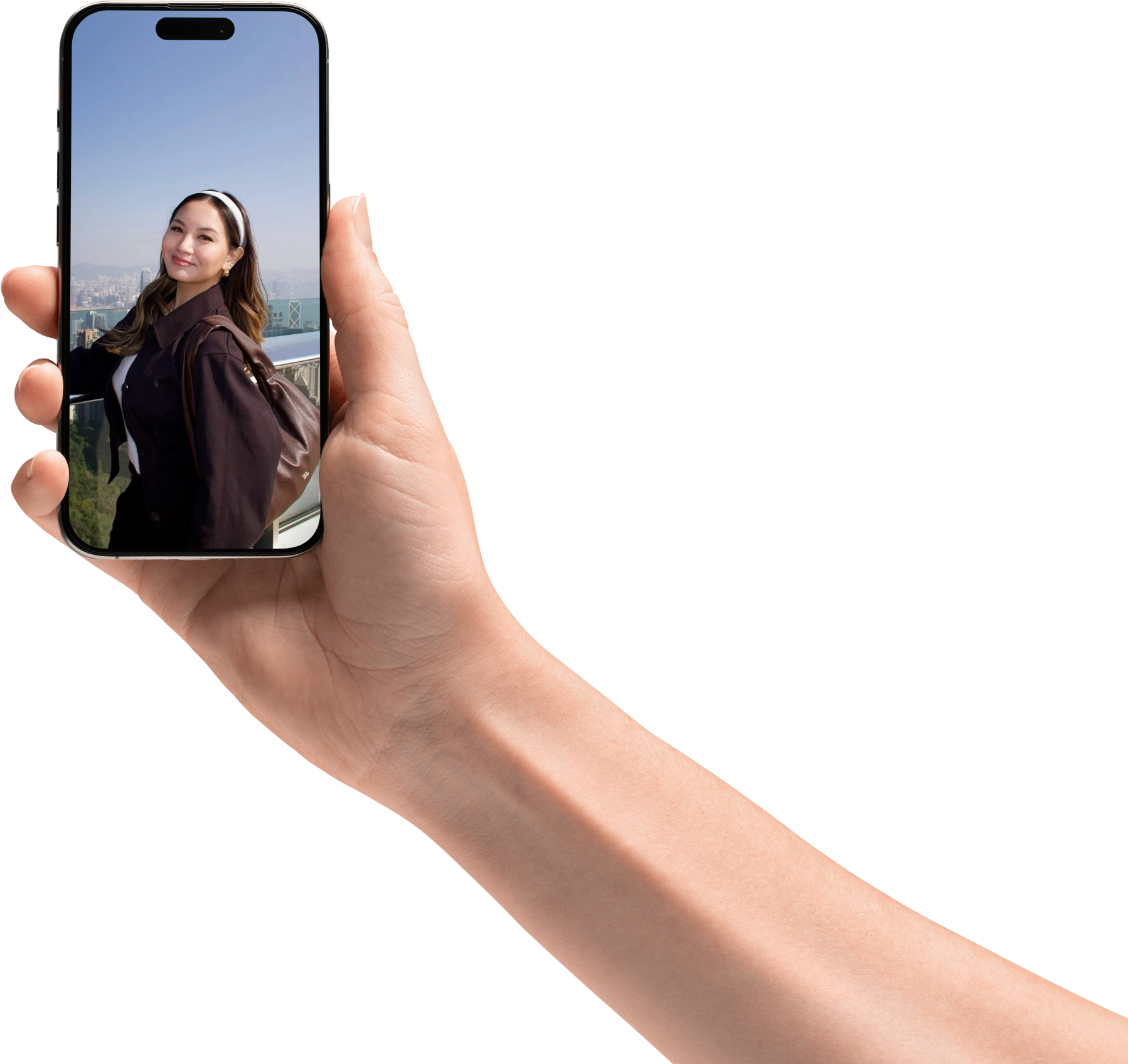 Hand holding iPhone displaying Justine's photo